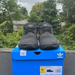 All black size 9 1/2 NMD prime blue adidas shoes